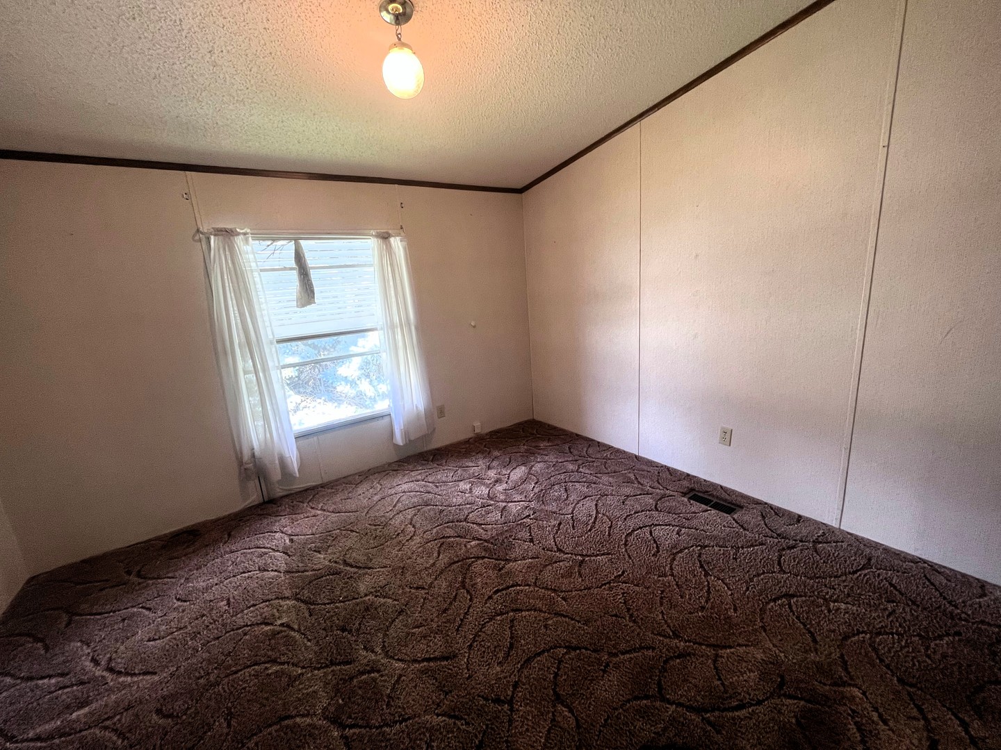 8653 Fig Tree Lane Roscoe, IL 61073 - Photo 12 of 22 a view of empty room with window