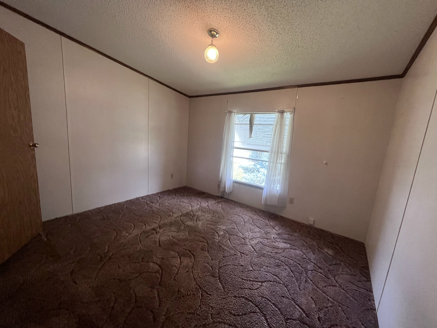 8653 Fig Tree Lane Roscoe, IL 61073 - Photo 13 of 22 a view of empty room with window