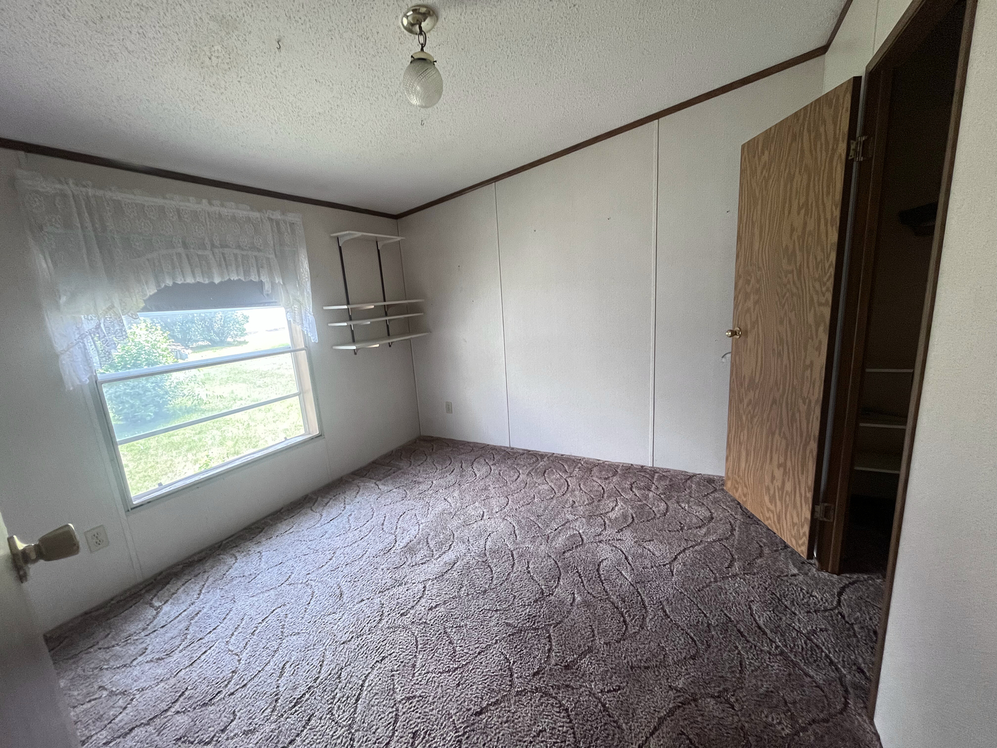 8653 Fig Tree Lane Roscoe, IL 61073 - Photo 14 of 22 a view of empty room with windows
