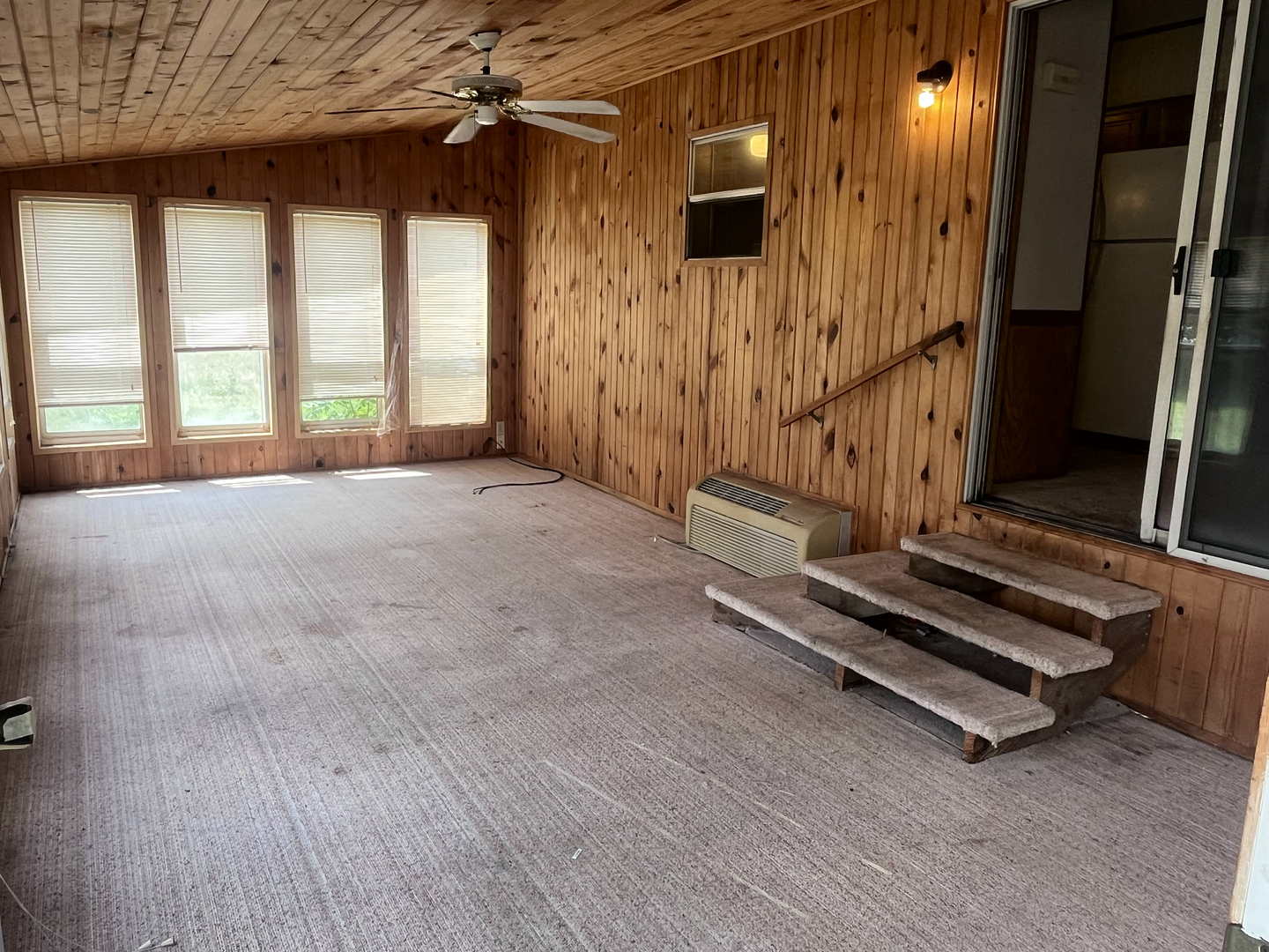 8653 Fig Tree Lane Roscoe, IL 61073 - Photo 20 of 22 a view of an empty room with a fireplace