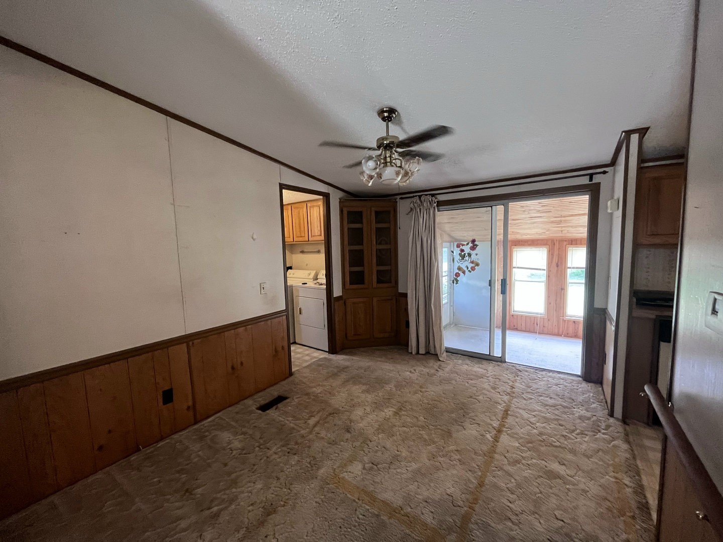 8653 Fig Tree Lane Roscoe, IL 61073 - Photo 7 of 22 a view of an empty room with a window