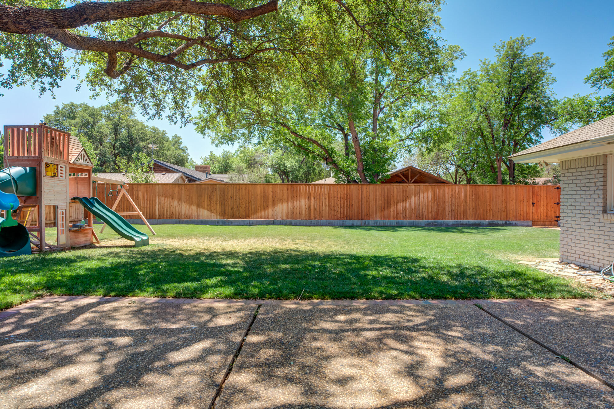 4507 8th Street Lubbock, TX 79416 - Photo 38 of 42 a view of backyard with a garden and entertaining space