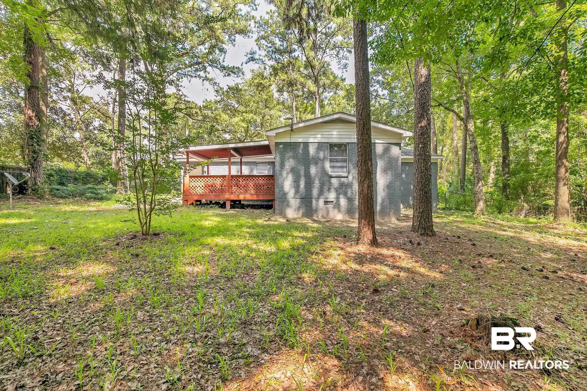 3304 Armond Drive Mobile, AL 36605 - Photo 44 of 62 View of yard featuring a sunroom