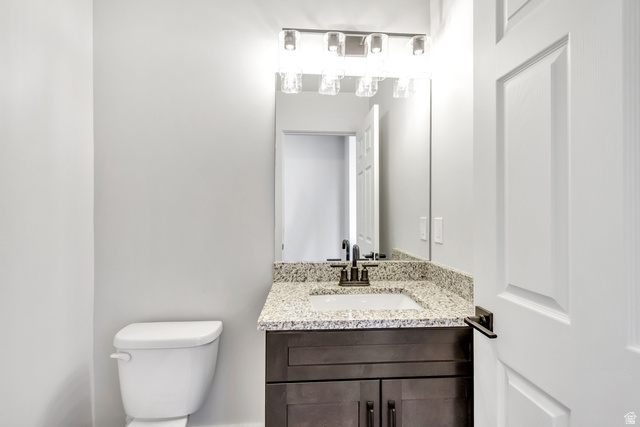 547 North Hvn Drive Mapleton, UT 84664 - Photo 10 of 23 Bathroom with vanity and toilet