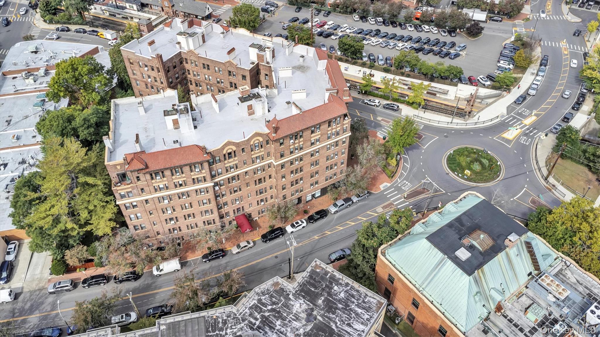 8 Barstow Road, Unit 7H Great Neck, NY 11021 - Photo 24 of 27 an aerial view of a city