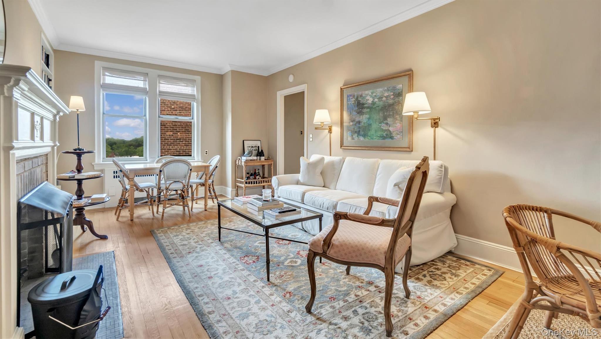 8 Barstow Road, Unit 7H Great Neck, NY 11021 - Photo 6 of 27 a living room with furniture and a window