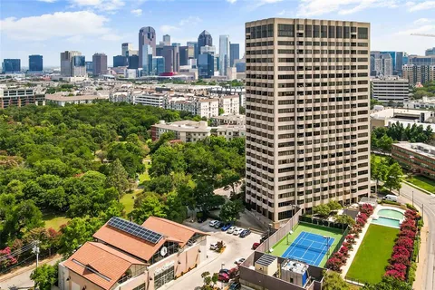 a view of a city with tall buildings