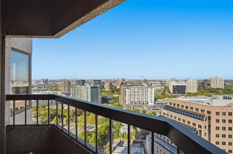 a view of city from a balcony
