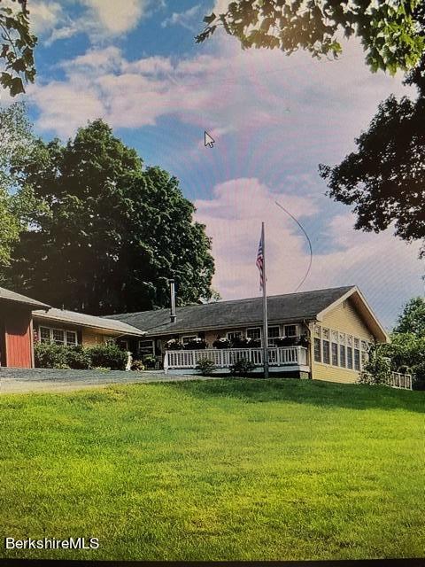 340 Sam Hill Road Worthington, MA 01098 - Photo 1 of 1 a view of a house with a big yard