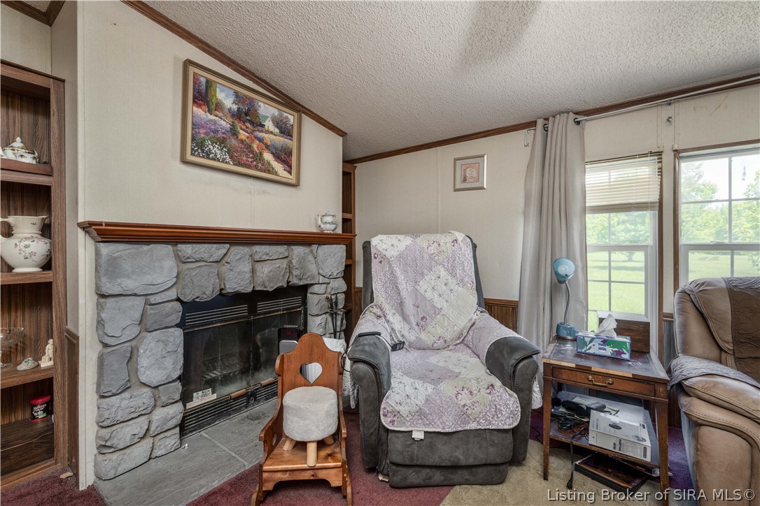 11318 Cortner Road Marysville, IN 47141 - Photo 14 of 43 Woodburning fireplace in family room