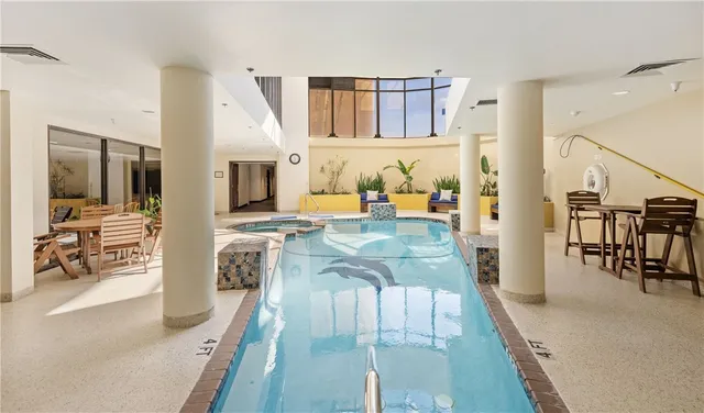 a view of a living room and dining room