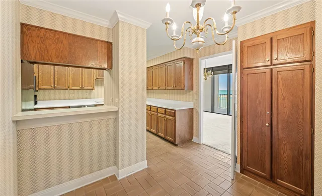 a view of a kitchen with a sink