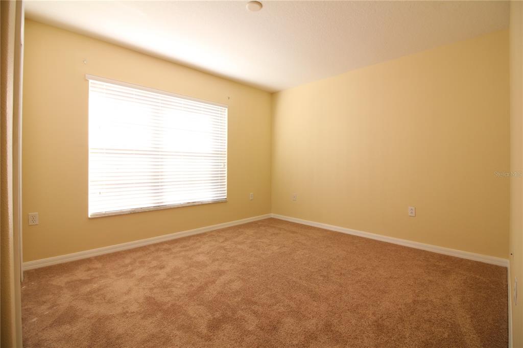 5433 Quarry Rock Road Lakeland, FL 33809 - Photo 22 of 26 an empty room with a window