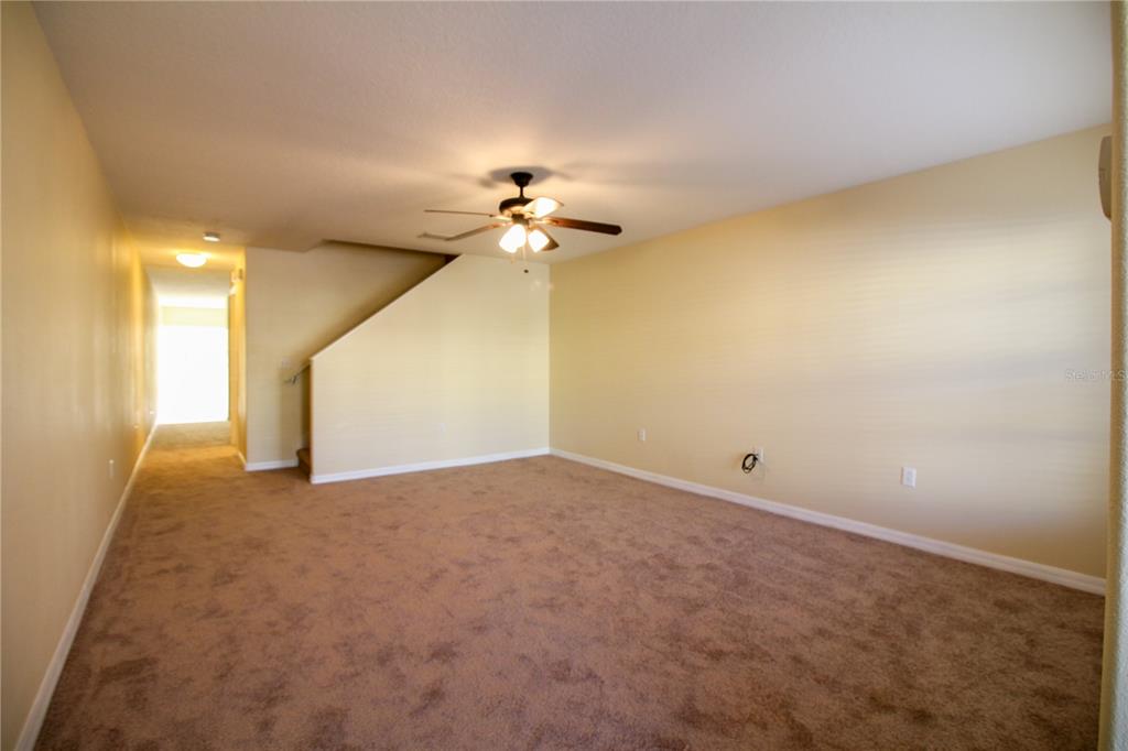 5433 Quarry Rock Road Lakeland, FL 33809 - Photo 5 of 26 a view of a big room with carpet