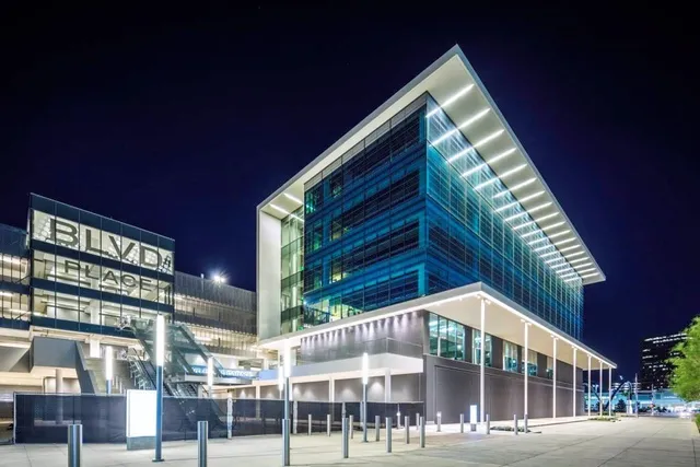 a view of a building with a swimming pool