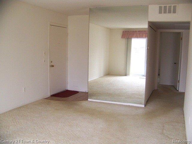 1508 Normandy Road, Unit 109 Royal Oak, MI 48073 - Photo 15 of 16 Living Room.jpg