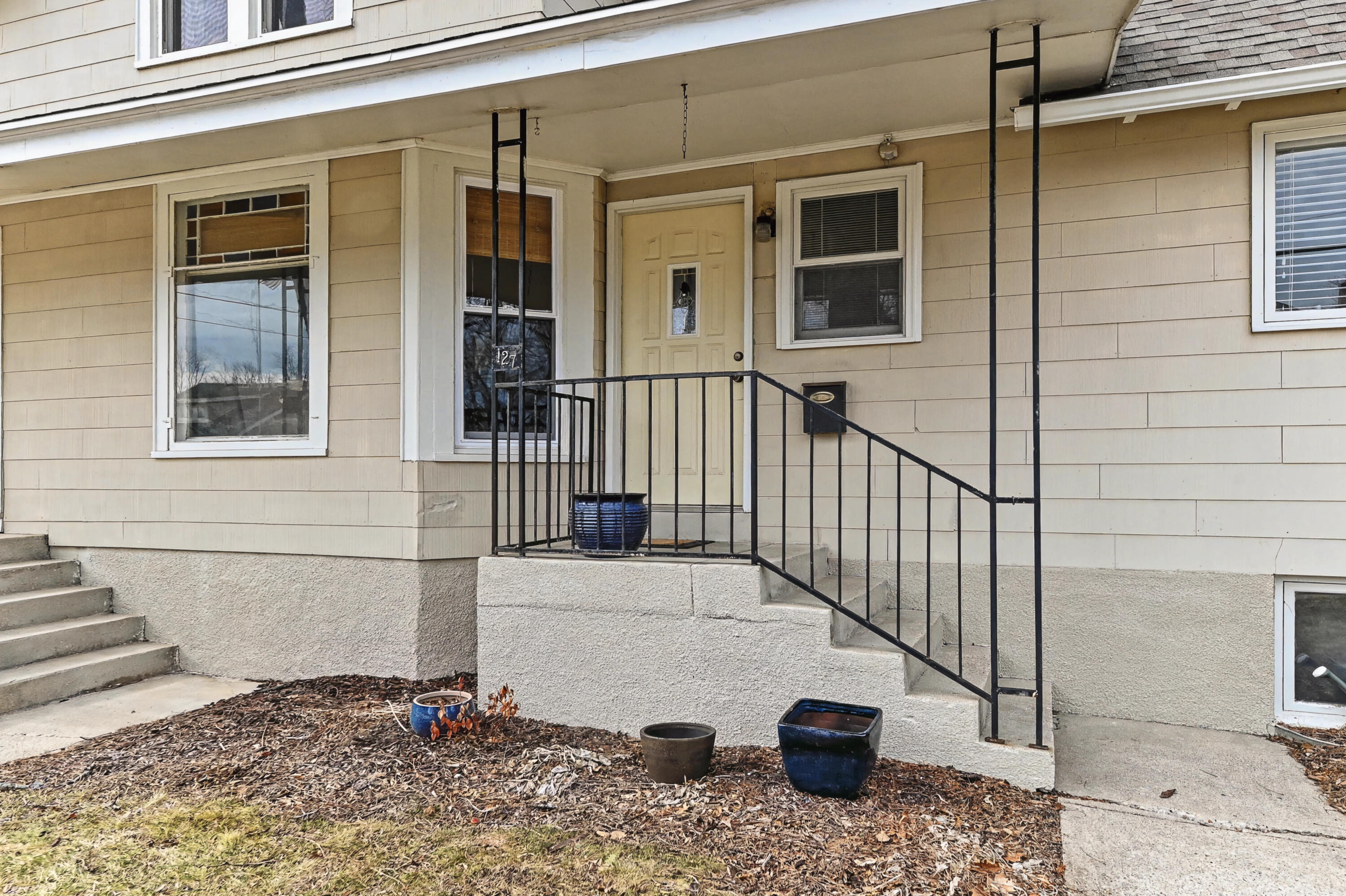 127 Clark Street Pewaukee, WI 53072 - Photo 3 of 38 Unit 1 Entry