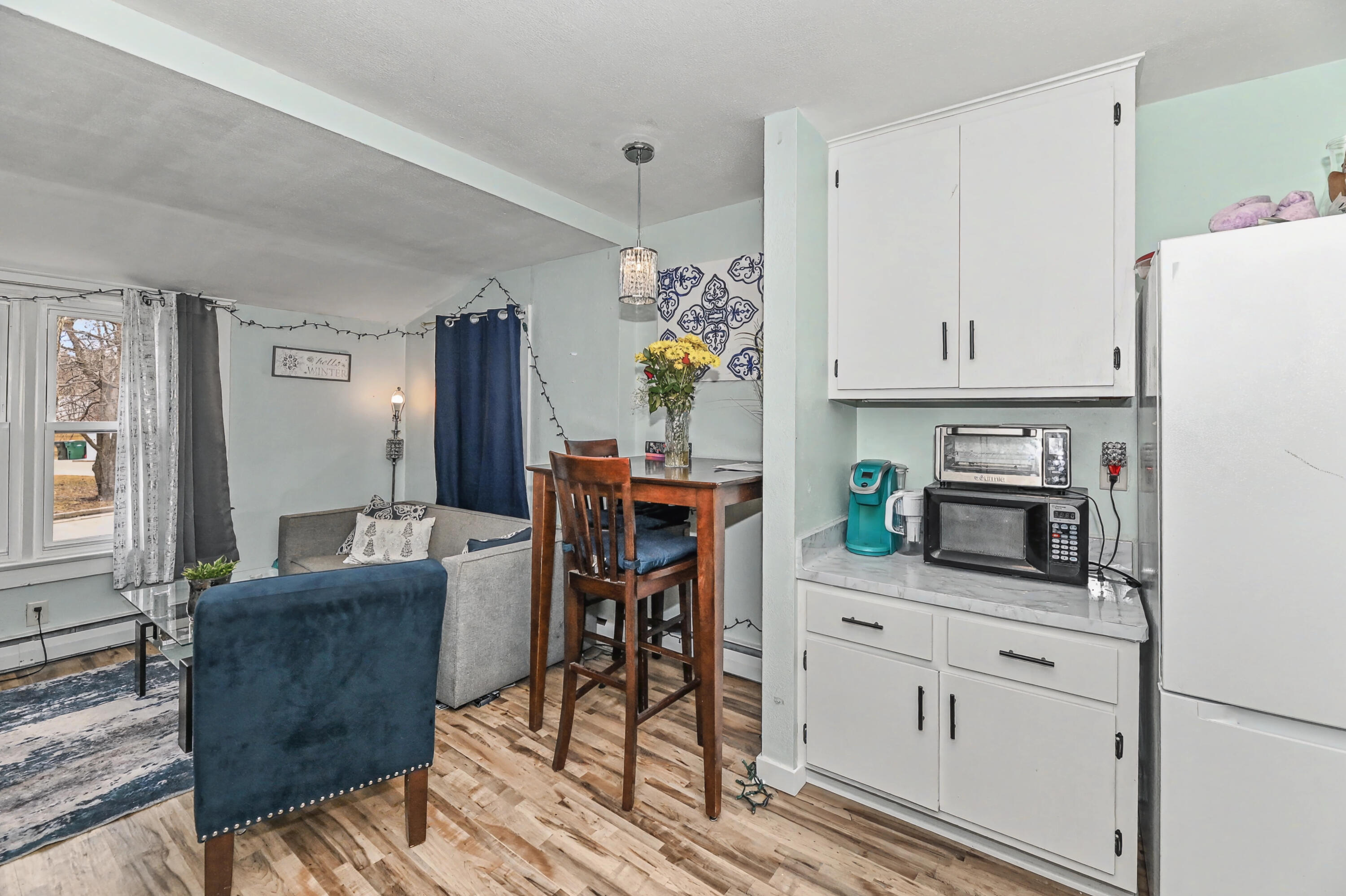 127 Clark Street Pewaukee, WI 53072 - Photo 33 of 38 Unit 3 Kitchen/Living Room