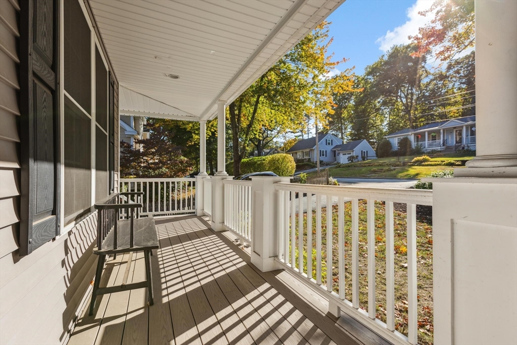 83 County Road Reading, MA 01867 - Photo 14 of 42 a view of a brick house with large windows