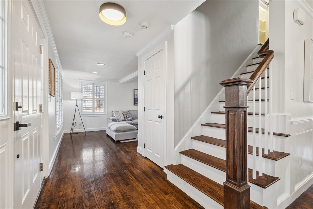 83 County Road Reading, MA 01867 - Photo 15 of 42 a view of entryway and hall with wooden floor