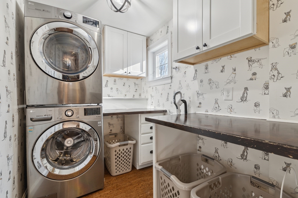 83 County Road Reading, MA 01867 - Photo 24 of 42 a utility room with sink dryer and washer