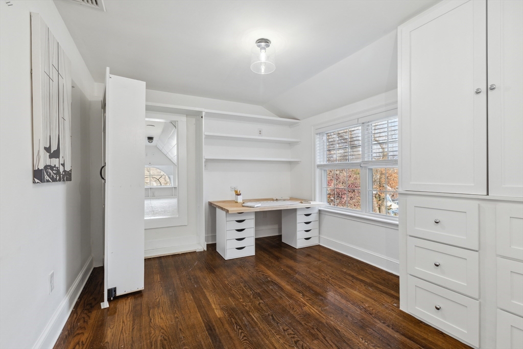 83 County Road Reading, MA 01867 - Photo 37 of 42 a kitchen with white cabinets and window