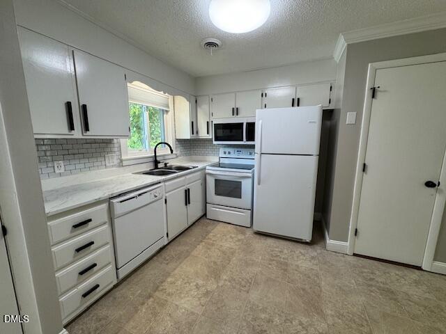 4100 Pittsford Road Raleigh, NC 27604 - Photo 6 of 14 a kitchen with appliances a sink and a window