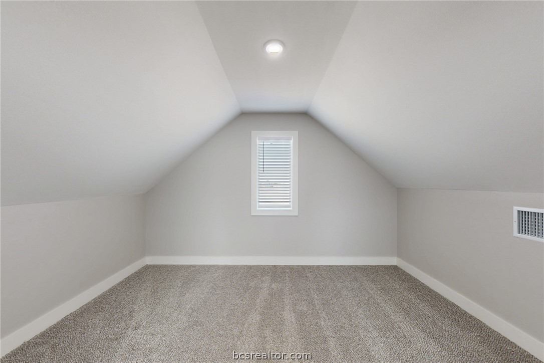 13504 Hudson Farms Road Hearne, TX 77859 - Photo 46 of 48 section 2 of bonus area. Wouldn't a pool table or ping pong be perfect here? This would also be a fun bedroom because of the extended areas for closets, walk-in Christmas storage, or crafts.
