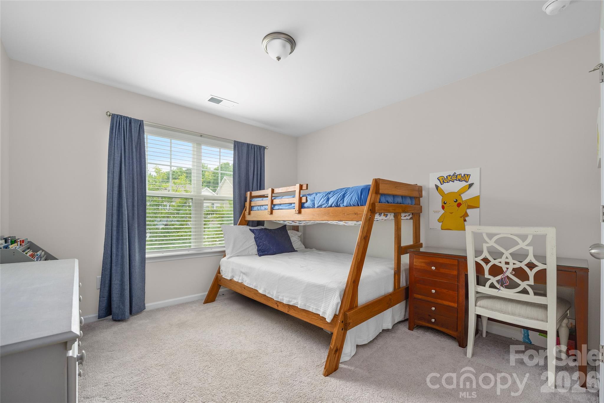 17219 Shearer Road Davidson, NC 28036 - Photo 22 of 34 a bedroom with a bed and a window