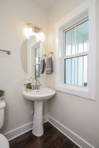 487 Norene Road Lebanon, TN 37090 - Photo 11 of 24 a bathroom with a sink toilet and mirror