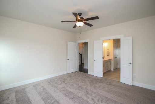 487 Norene Road Lebanon, TN 37090 - Photo 13 of 24 a view of a livingroom with a ceiling fan and entryway