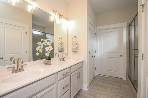 487 Norene Road Lebanon, TN 37090 - Photo 14 of 24 a bathroom with a double vanity sink and mirror