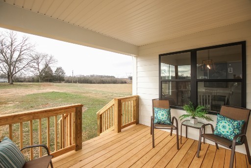 487 Norene Road Lebanon, TN 37090 - Photo 22 of 24 a view of a balcony with lake view and wooden floor