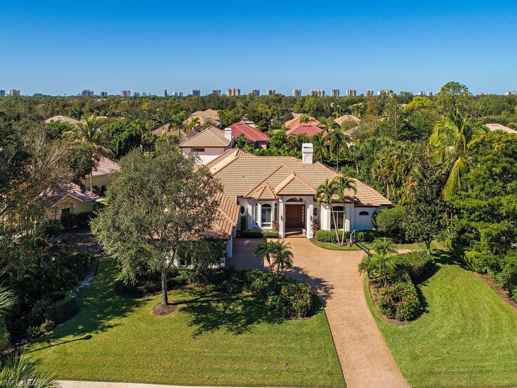 7347 Stonegate Drive Naples, FL 34109 - Photo 19 of 20 an aerial view of a house