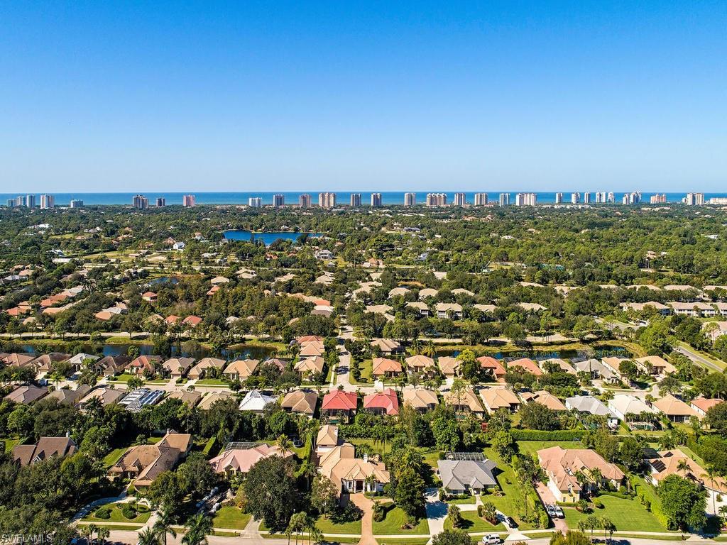 7347 Stonegate Drive Naples, FL 34109 - Photo 20 of 20 an aerial view of a city