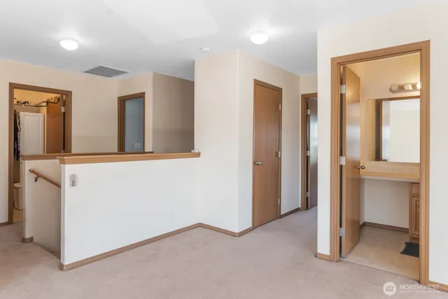 a bathroom with a sink toilet a mirror and shower