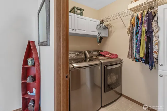 a view of a house with a table and chairs