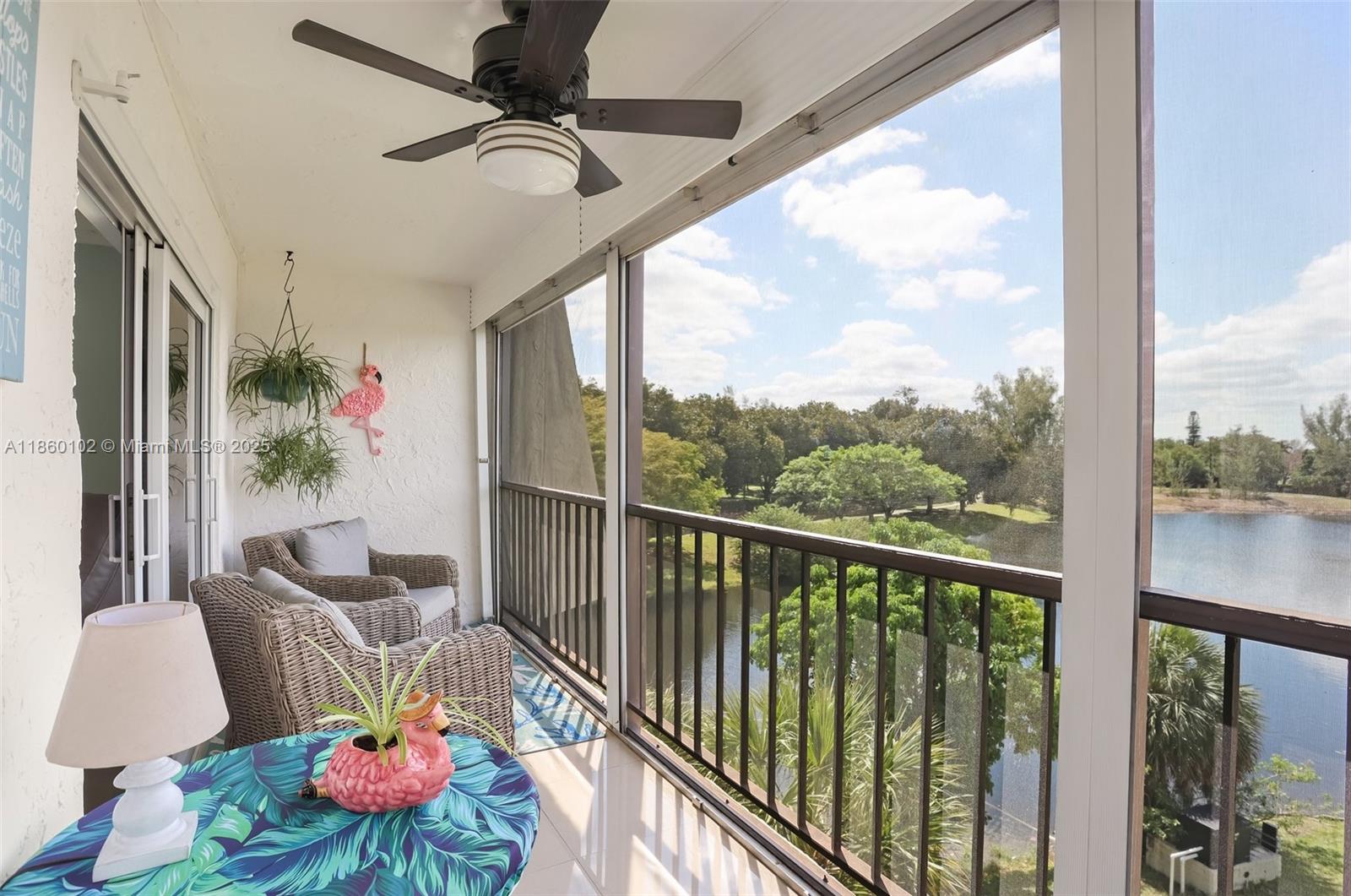 6020 Northwest 44th Street, Unit 401 Lauderhill, FL 33319 - Photo 13 of 35 a outdoor living space with furniture