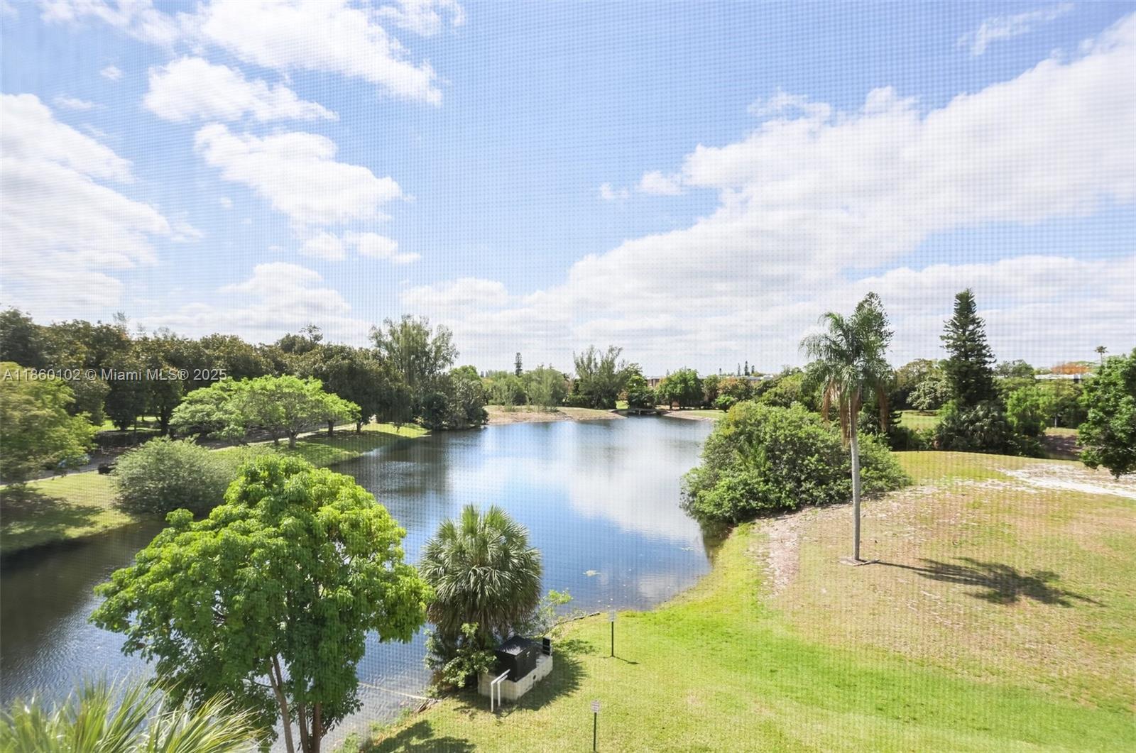 6020 Northwest 44th Street, Unit 401 Lauderhill, FL 33319 - Photo 14 of 35 a view of a lake