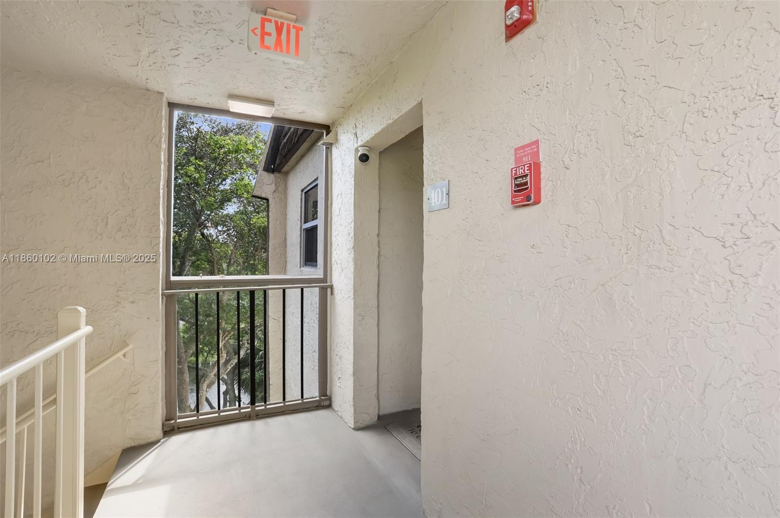 6020 Northwest 44th Street, Unit 401 Lauderhill, FL 33319 - Photo 4 of 35 a view of a hallway
