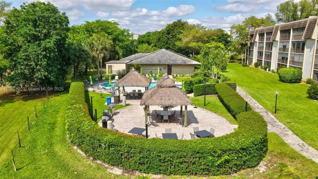 a view of a swimming pool with a patio