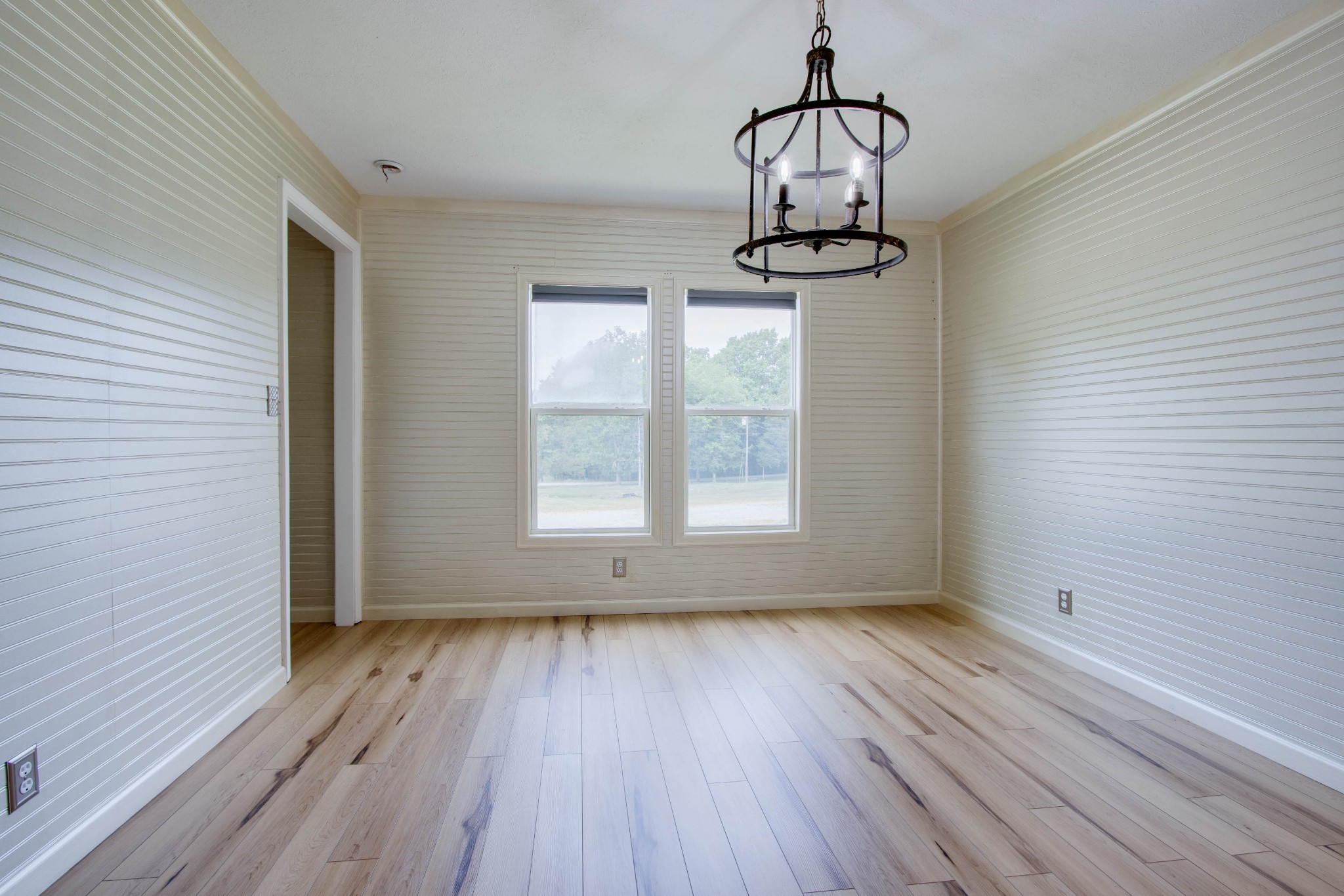 591 Alsup Road Lascassas, TN 37085 - Photo 17 of 32 a view of a room with wooden floor cabinets and a window