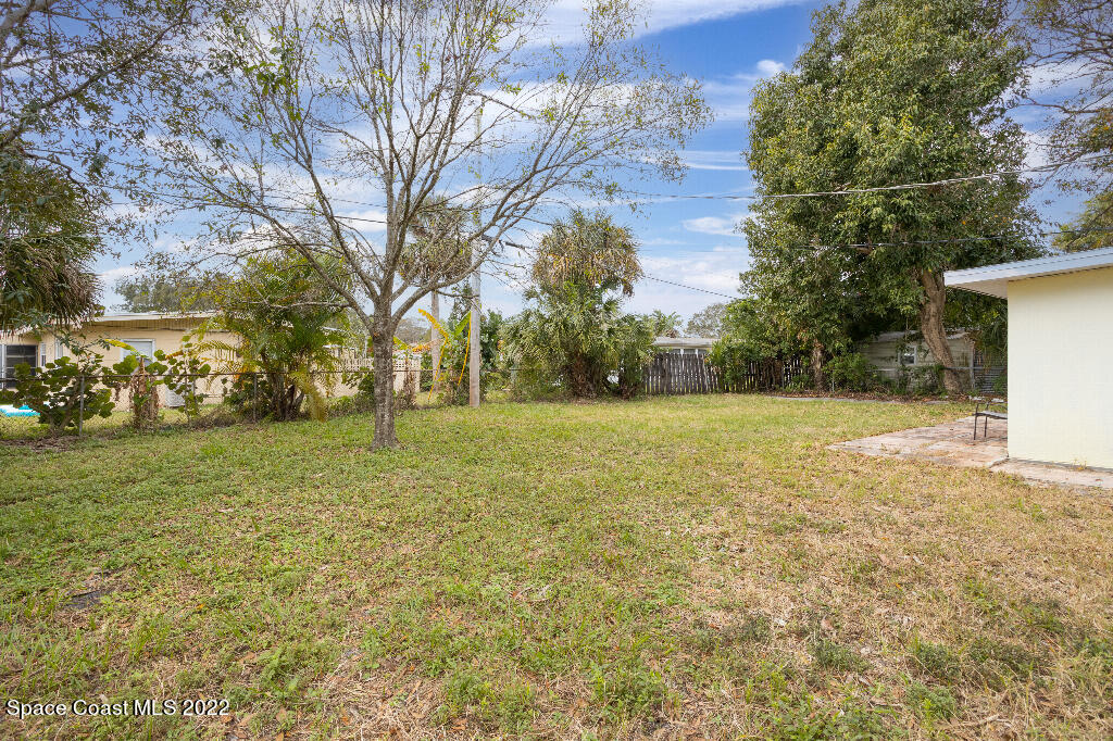 734 Bonnie Circle Melbourne, FL 32901 - Photo 15 of 15 a view of yard with tree
