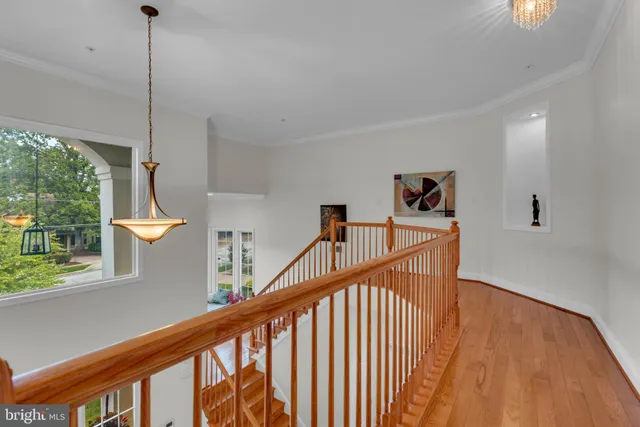 a view of a chair and table on the garden