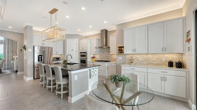 a bathroom with double sink and a mirror