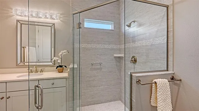 an aerial view of a house with swimming pool garden and patio