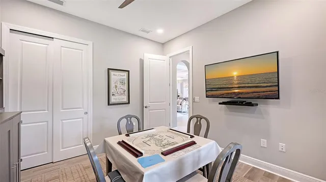 an aerial view of a house with a yard and potted plants