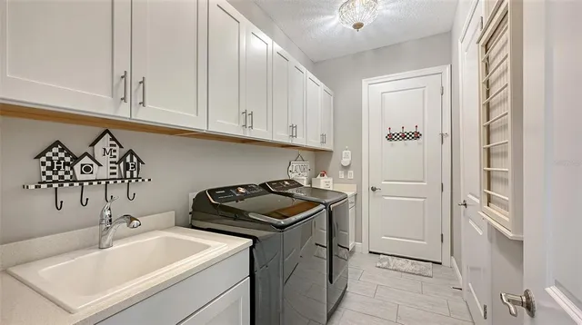 a view of a swimming pool with a yard