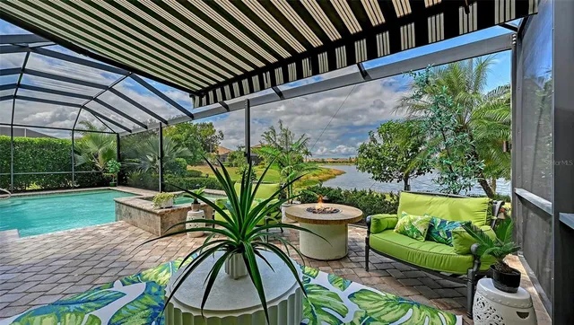 a view of a swimming pool and lounge chair