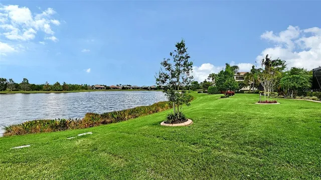a view of a dining room with furniture and window